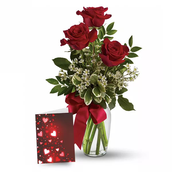 Red roses bouquet with card.