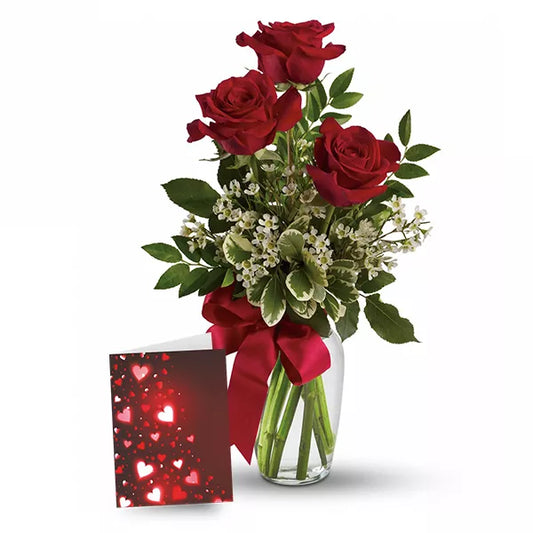 Red roses bouquet with card.